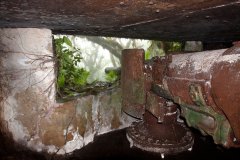 15 cm Japanese naval gun inside a bunker on Kupwuriso Mountain, U, Pohnpei, Micronesia